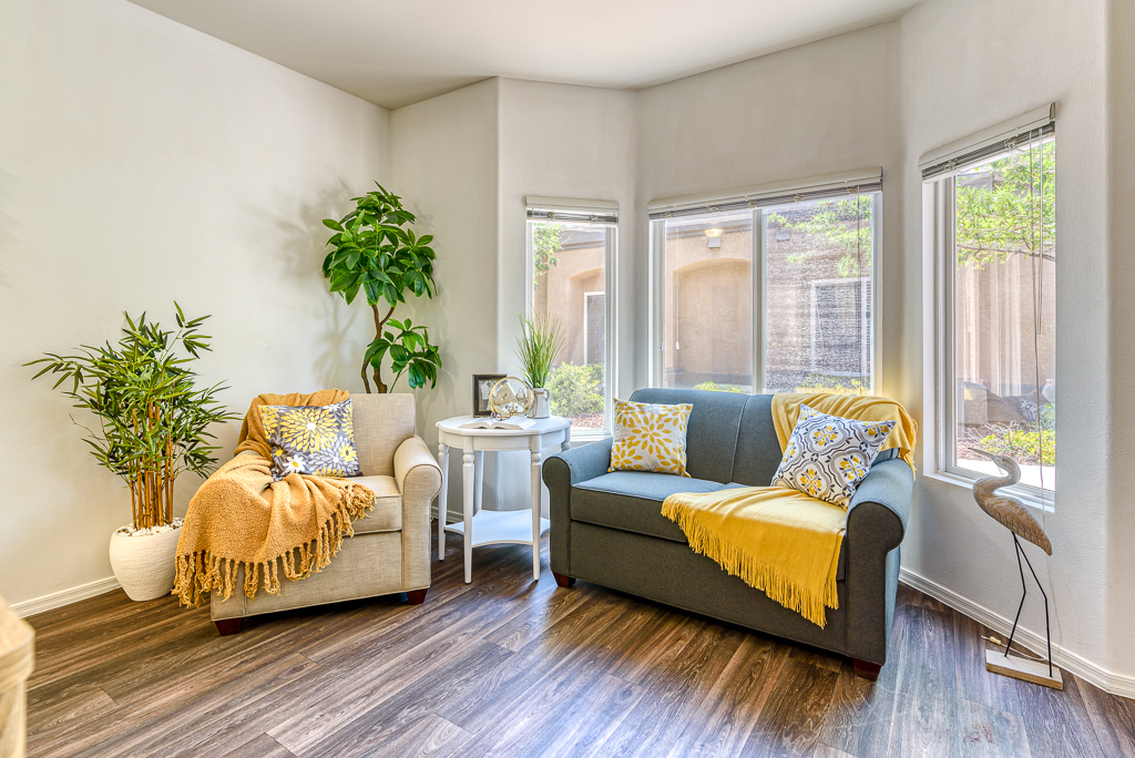 living room with couch and armchair